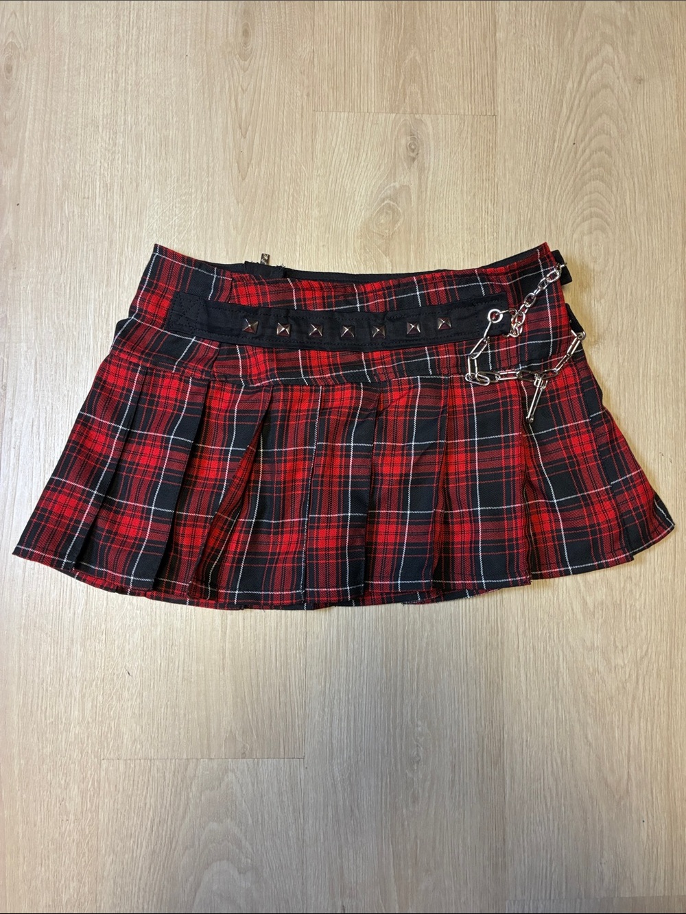 Tripp NYC Red and Black Plaid Pleated Mini Skirt with Studded Waist & Chain
